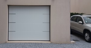 Porte de garage sectionnelle ALUDOOR avec inserts